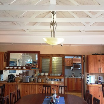 Dining room with high vaulted ceilings