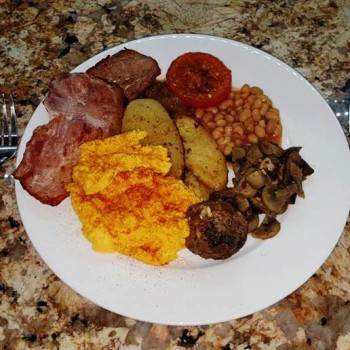 English breakfast with scrambled eggs